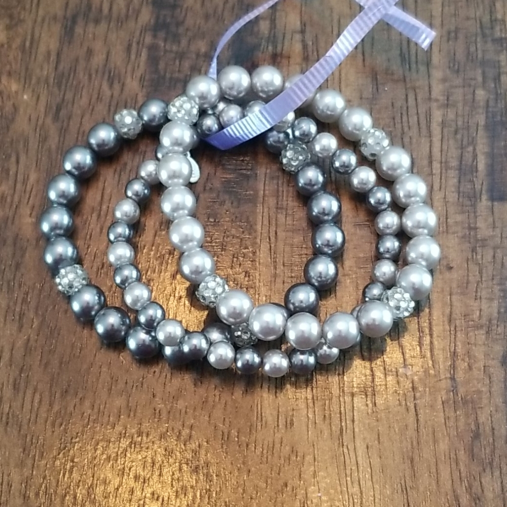 Lot of three faux pearl stretch bracelets